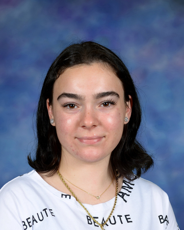 a man wearing a hat and glasses