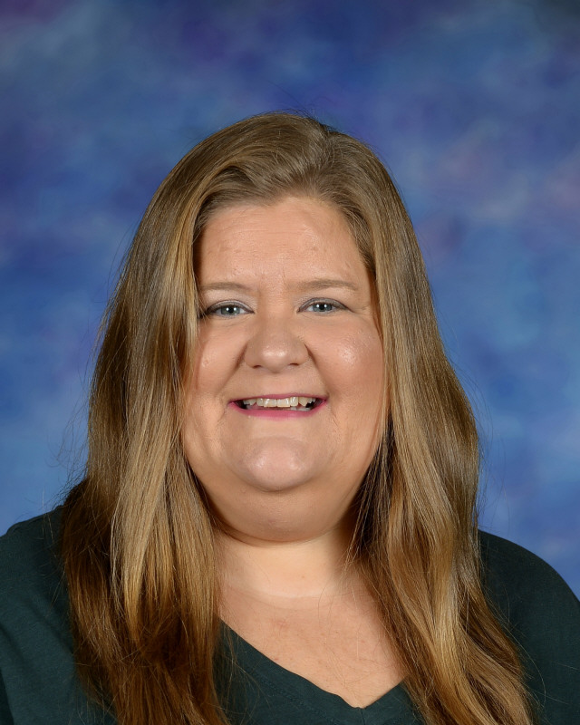a man wearing a hat and glasses