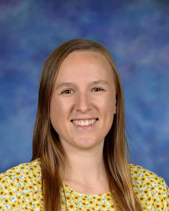 a man wearing a hat and glasses