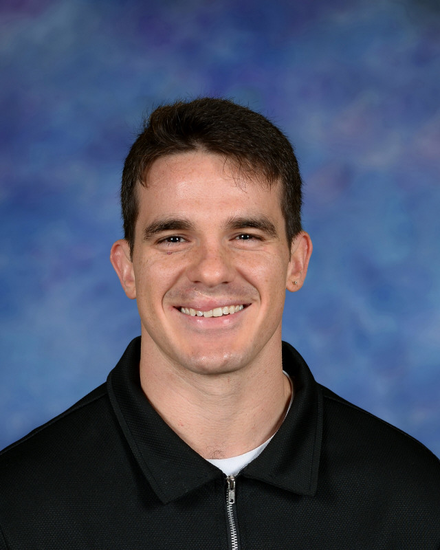 a man wearing a hat and glasses