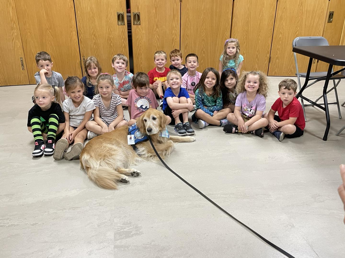 preschool myra three men and laughing two women walking side by side